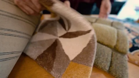 Soft Touch: A Hand Gently Strokes the Mats 스톡 동영상 304607867