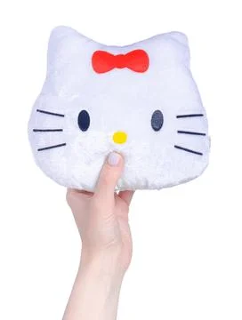 Soft toy cat in hand Stock Photos