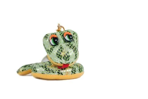 Soft toy small green smiling snake isolated on white background Stock Photos