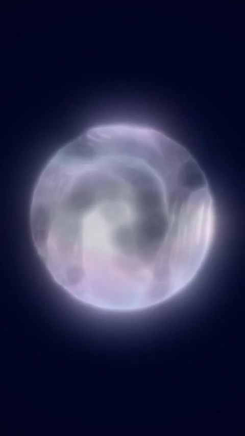 Soft translucent orb floating in a dark blue space, creating a mysterious a.. Stock Footage 335263661