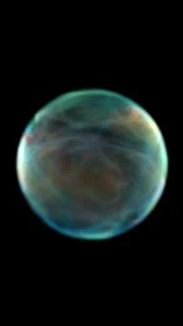 Soft translucent orb with subtle multicolor gradients floating on black bac.. Illustrazione stock