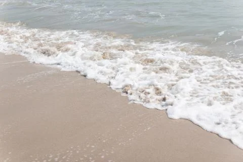 Soft ware on sand at the beach, copy space for text Photos