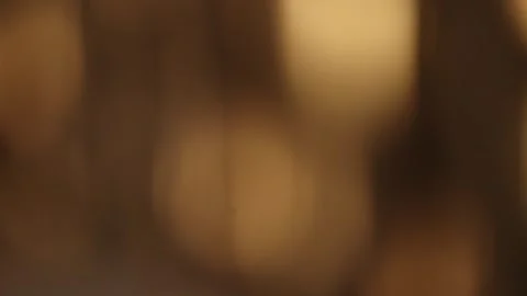 Soft Warm Abstract Blur Background with Golden Light Bokeh Stock Footage 325476550