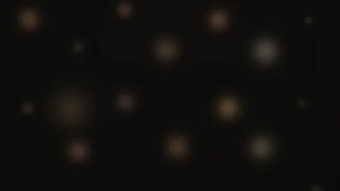 Soft Warm Bokeh Lights on Black Seamless Loop Stock Footage 340577654