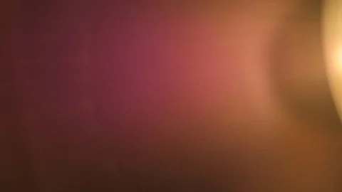 Soft warm light hovering over the frame on a dark background Stock Footage 106437778