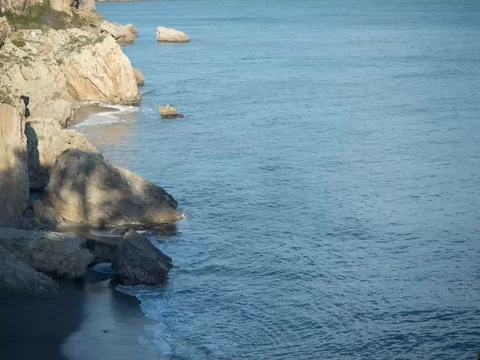 Soft water against the rocks Stock Footage 102332759