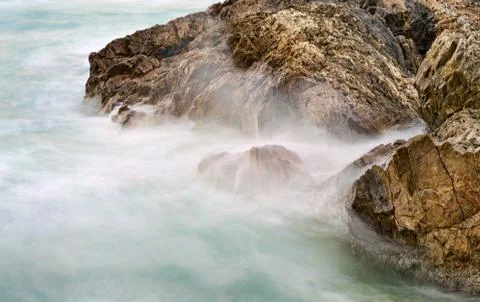 Soft water on rocks Stock Photos