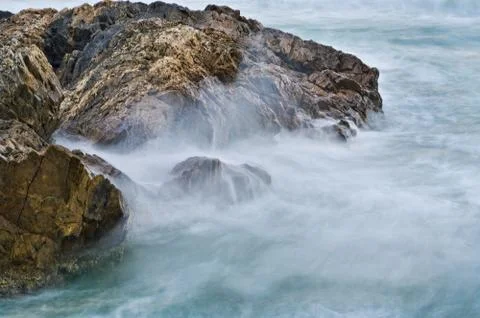Soft water on rocks Stock Photos