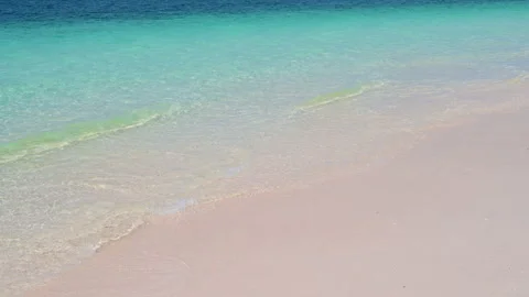 Soft wave with the blue ocean on a sandy beach. Stock-Footage 153389179