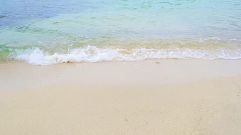 Soft wave with the blue ocean on a sandy beach. Stock-Footage 156851786