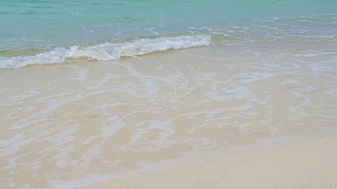 Soft wave with the blue ocean on a sandy beach. Stock-Footage 158344414