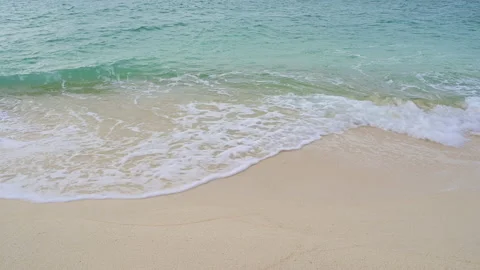 Soft wave with the blue ocean on a sandy beach. Stock-Footage 158344657