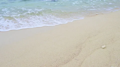 Soft wave with the blue ocean on a sandy beach. Stock-Footage 158346385