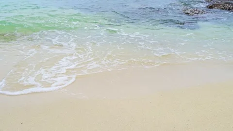 Soft wave with the blue ocean on a sandy beach. Stock Footage 159264336