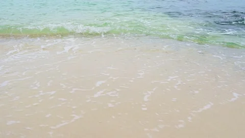 Soft wave with the blue ocean on a sandy beach. Stock Footage 159264616