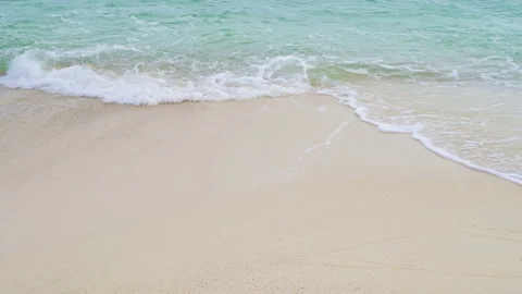 Soft wave with the blue ocean on a sandy beach. Stock Footage 160710568