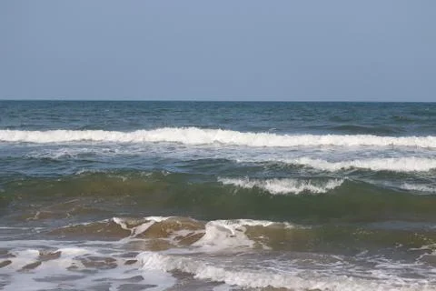 Soft wave of blue ocean on sandy beach.Summer beach and sea, marina beach Stock Photos