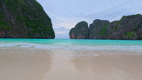 Soft wave of blue sea and sand on summer holidays beautiful beach as hyperlapse Video stock 314284341