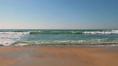 Soft wave of blue sea on sandy beach Stock Footage 130702658