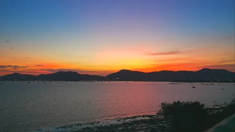 Soft wave breaking shore beach with mangrove tree forest, sailing boat, yacht Stock Footage 127733973