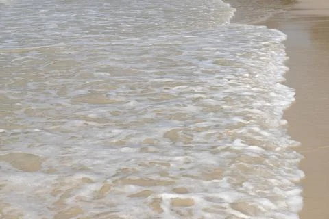 Soft wave  on sandy beach. Background. Foto stock