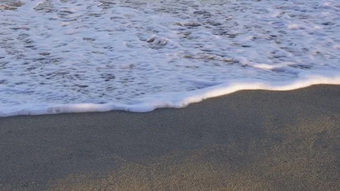 Soft wave on a sandy beach Stock Footage 74177680