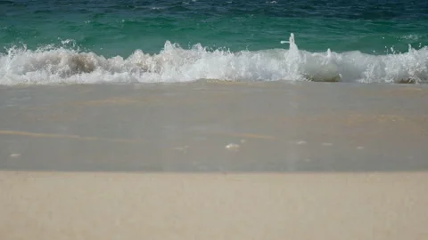 Soft wave of the sea , clear water on the white sand beach Stock Footage 134802153