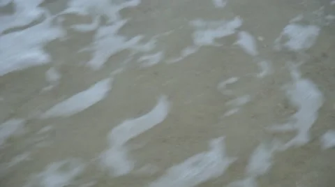 Soft wave of the sea on the sandy beach. Serene and peaceful holiday background  Stock Footage 50399628