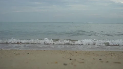 Soft wave of the sea on the sandy beach. Serene and peaceful holiday background  Stock Footage 50399637