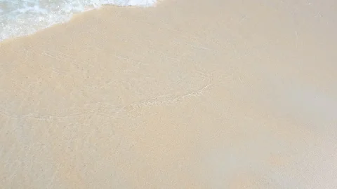 Soft wave of the sea on the sandy beach. 4K UHD Stock Footage 88330595