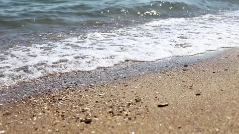 Soft wave of sea on sandy beach, sunny day. Stock Footage 111070994