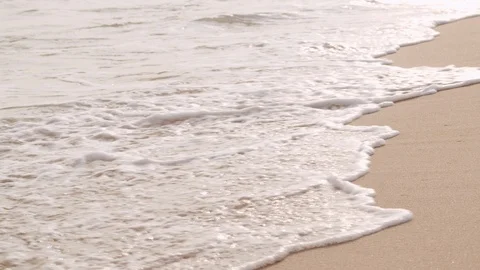 Soft wave of the sea on the sandy beach in the summer of thailand. Stock Footage 122581052