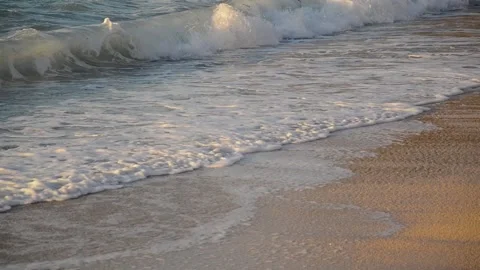 Soft waves on beach with golden sand. Foamy soft wave. Tropical Landscape Stock Footage 142592783