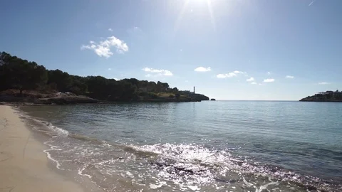 Soft waves at beach in Portocolom, idyllic bay seaside on Majorca, Spain Stock Footage 100674354