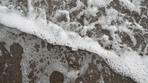 Soft waves coming into shore on a beach, low angle 스톡 동영상 114544636