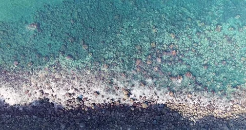 Soft waves crashing on the beach, drone top shot, Tenerife Stock Footage 119107192