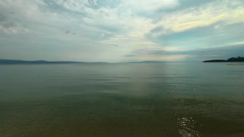 Soft waves kiss sandy shore gently. Trani Ammouda, Greece Stock Footage 339616598