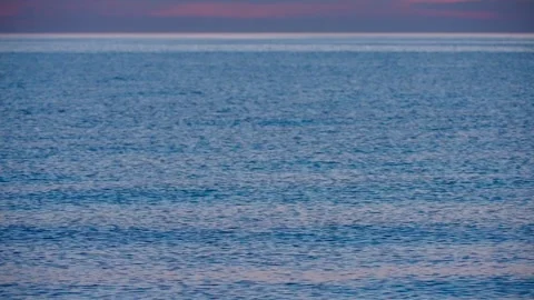 Soft waves on the ocean after sunset Stock Footage 272942670