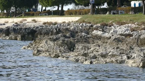 Soft Waves on the rock shore Stock Footage 50494764