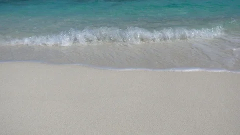 Soft waves on sandy sea beach. Turquoise water. Slow motion 240 fps Stock Footage 119153038