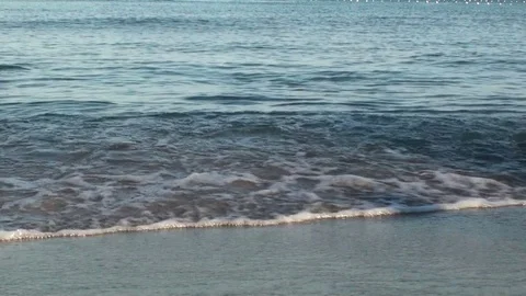 Soft waves of sea water on the sandy beach. HD 1920x1080 Video Clip Stock Footage 77338797