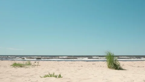 Soft waves touching sandy beach in untouched island Tropical holiday vacation 4K Stock Footage 112142944