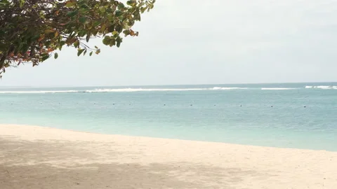 Soft waves washing over sandy beach. Beautiful sunny day at sea shore Stock Footage 139401036