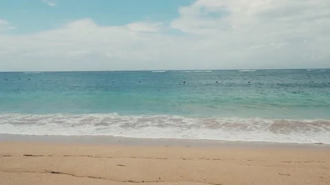 Soft waves washing over sandy beach. Beautiful sunny day at sea shore Stock Footage 139401049