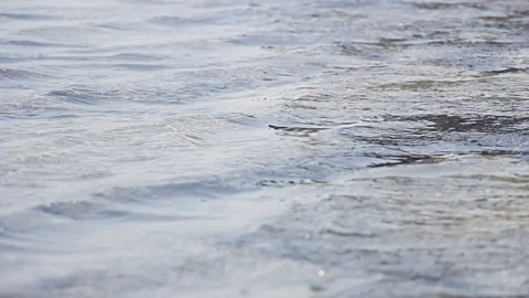 Soft waves in the water under the sun Stock Footage 113753811