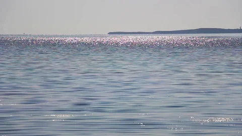Soft waves in the water under the sun Stock Footage 114230790
