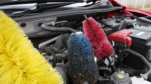 Soft wheel cleaning brushes set on Nissan pulsar car engine Video stock 141107736