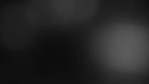 Soft White Blurry Lights Moving on Black Background. Seamless Loop. 動画素材 305870785