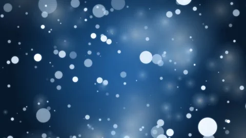 Soft white bokeh particles gently float and glow against a deep blue blurre.. Vídeos de archivo 346243743