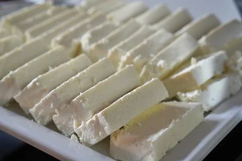 Soft White Cheese Cubes on a Buffet Tray Stock Photos
